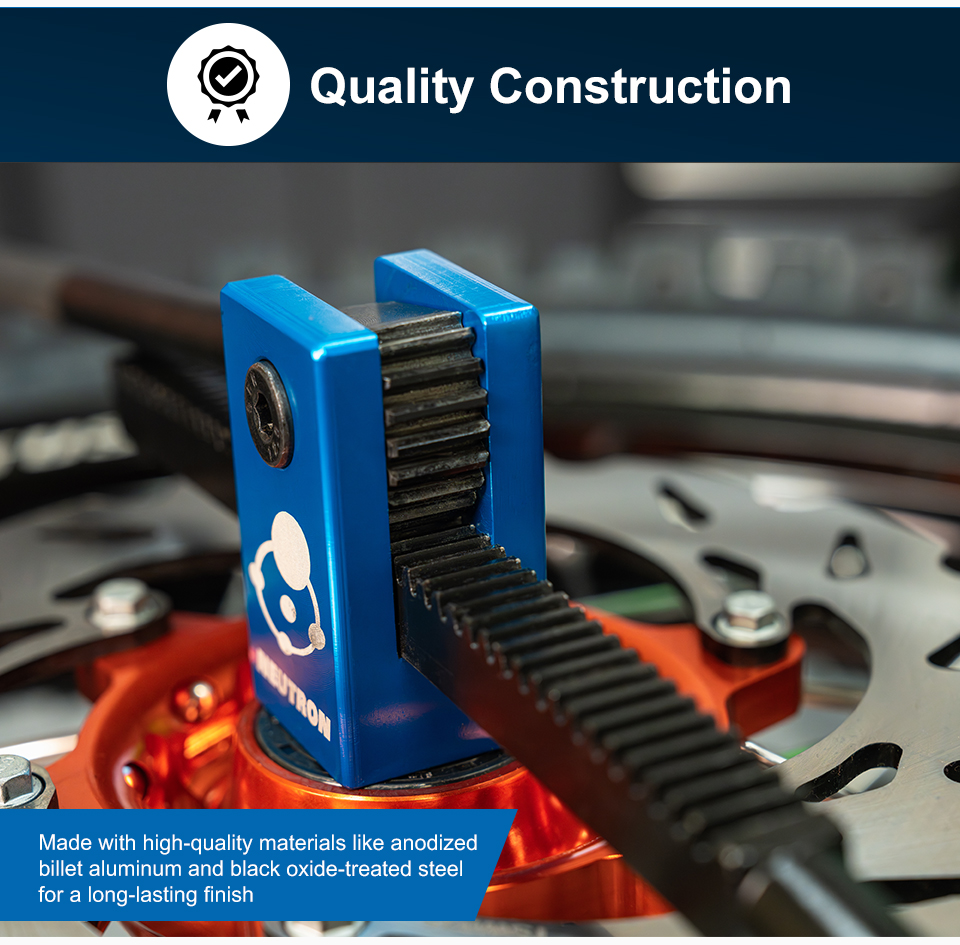 Quality Construction, a closeup image of the tool installed in a motorcycle wheel, made with high-quality materials like anodized billet aluminum and black oxide-treated steel for a long-lasting finish, link